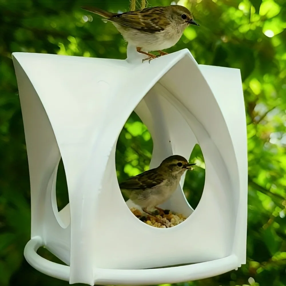 Ce petit mangeoire à oiseaux présente un design très | Animorah